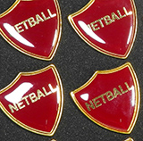 Clearance Bulk Netball Burgundy Shield Badges
